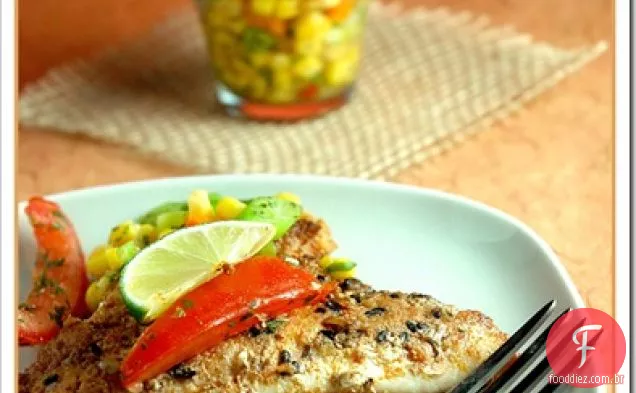 Sargo picante do mar de gergelim preto com salada de milho e coentro
