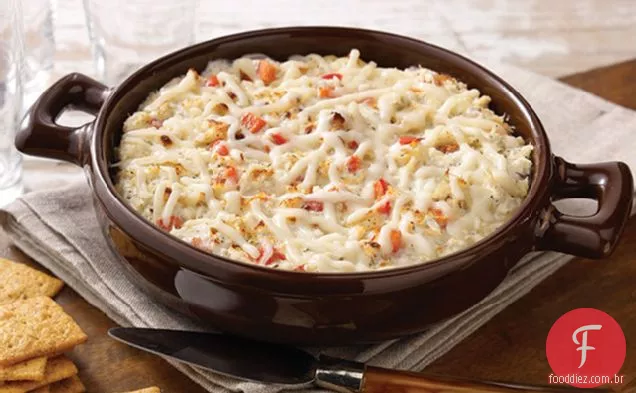 Caranguejo quente de queijo e pimenta vermelha espalhada