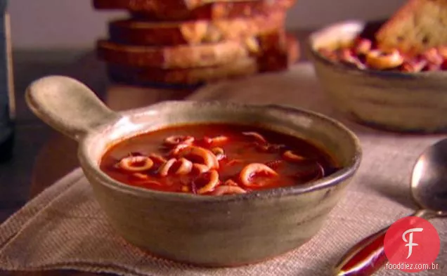 Guisado de lula com torrada de alho