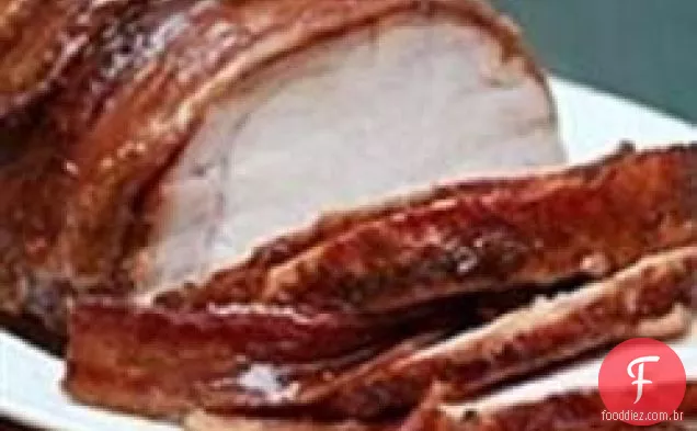 Lombo de porco embrulhado com Bacon com esmalte doce picante