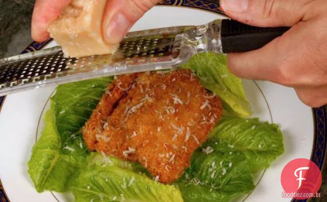 A barriga de porco frita de frango César