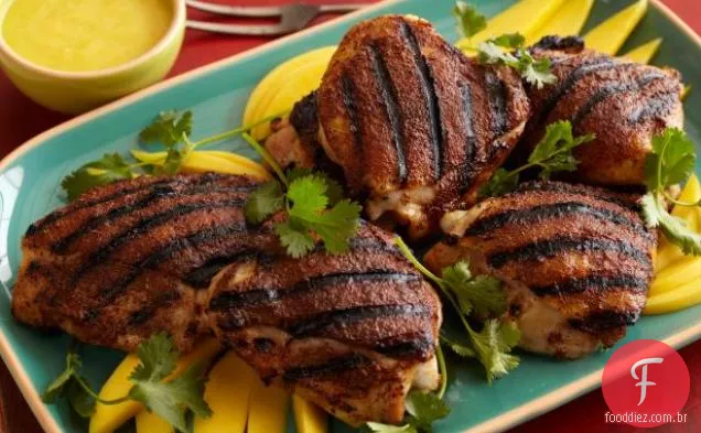 Jerk esfregou coxas de Frango Com Manga caseira-molho quente Habanero