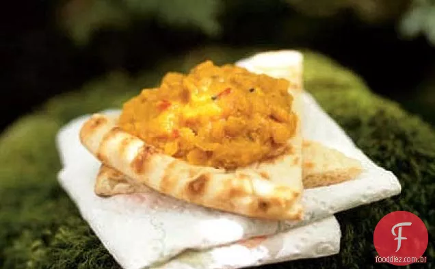 Lentilha vermelha picante Dal com cunhas Pita