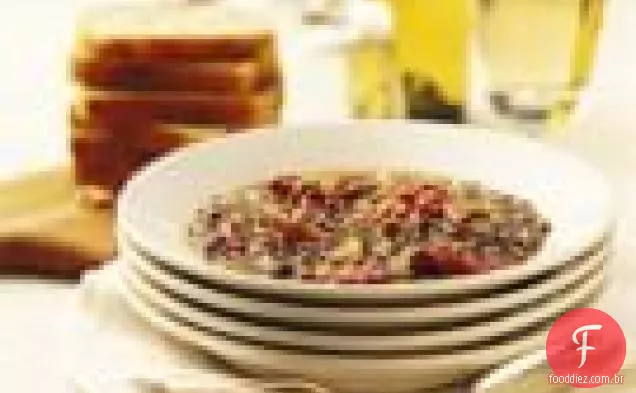Sopa de tomate e lentilha seca no forno