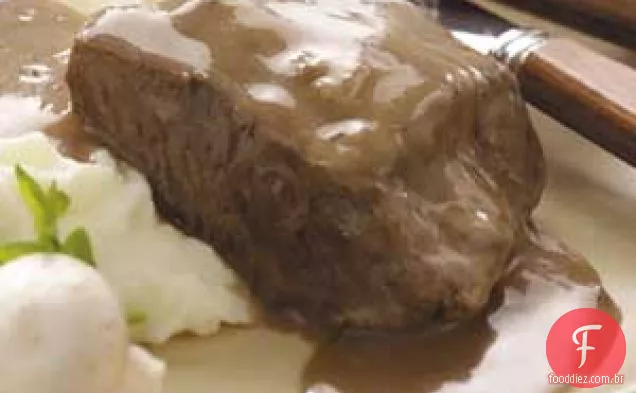 Carne em molho de cogumelos