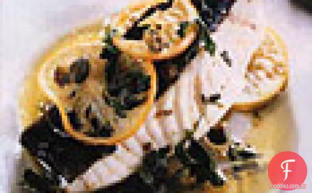 Peixe escalfado no forno em azeite