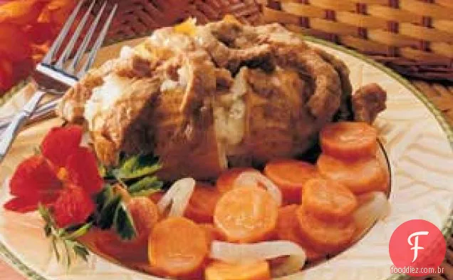 Bife sobre batatas