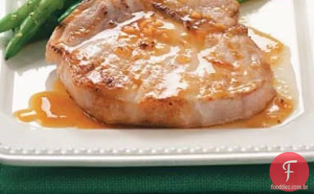 Costeletas de porco com molho de laranja para dois