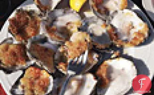 Ostras grelhadas com pão ralado de alho
