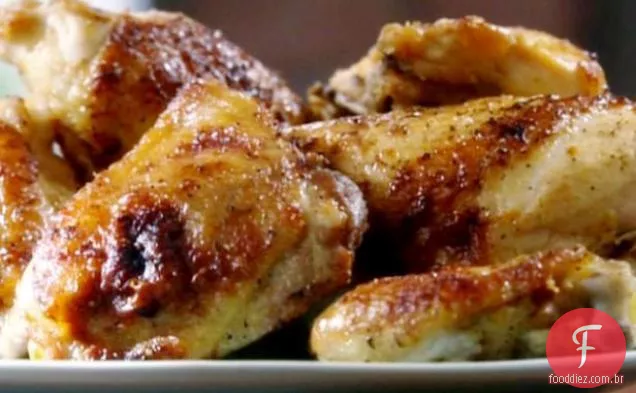 Frango assado com alho e frutas cítricas
