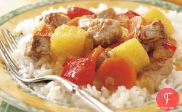 Carne de porco e abacaxi salteados