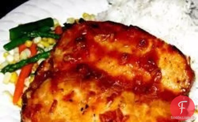 Lombo de porco glaceado com laranja e tempero italiano