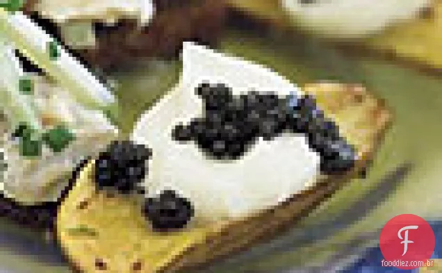 Batatas fritas com crème Fraîche e Caviar