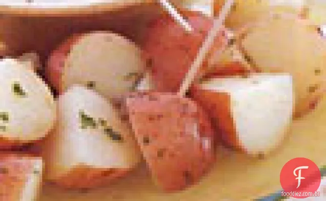 Batatas novas com Fondue de três queijos
