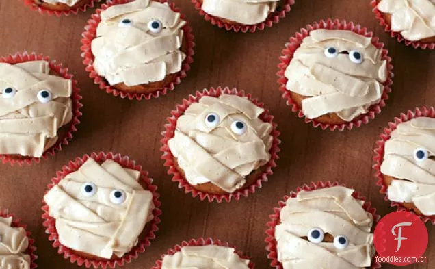 Queques Da Microplaqueta Da Abóbora Com Buttercream Do Açúcar Mascavo