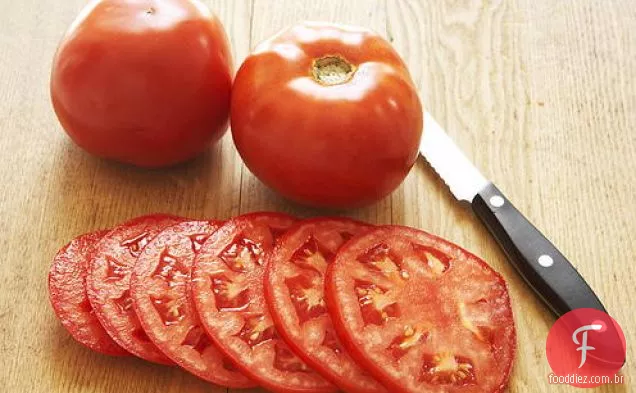 Peixe assado com tomate e Harissa