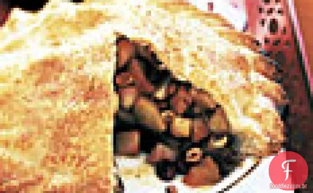 Torta de maçã com avelãs e cerejas azedas secas