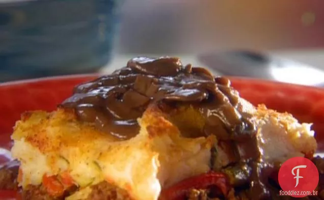 Torta de pastor com molho de cebola cogumelo