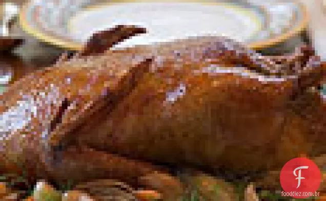 Pato assado lentamente com molho de azeitona e alho-funcho Confit