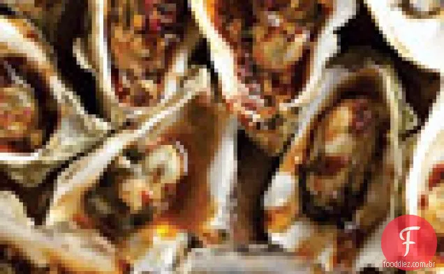 Ostras grelhadas em madeira em Chipotle vinagrete