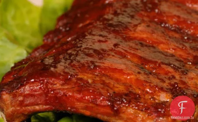 Costelas Traseiras Do Bebê Do Forno Com Molho Do Bbq De Hoisin