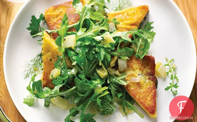 Bolo de grão de bico com folhas de Fava e salada de rúcula