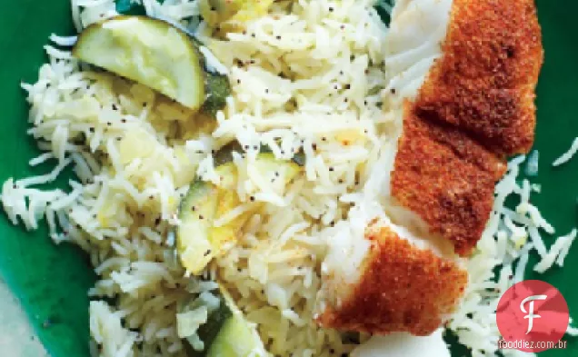 Peixe esfregado com especiarias com arroz limonado