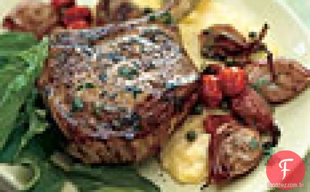 Costeletas de vitela com chalotas assadas, rúcula e Polenta macia